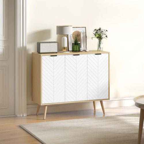 Aparador blanco y natural con decoración en un salón moderno