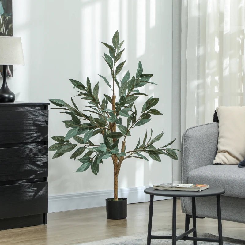 Árbol Verdolón de laurel artificial en un dormitorio