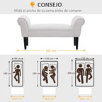 Banqueta colocada a los pies de la cama en el dormitorio