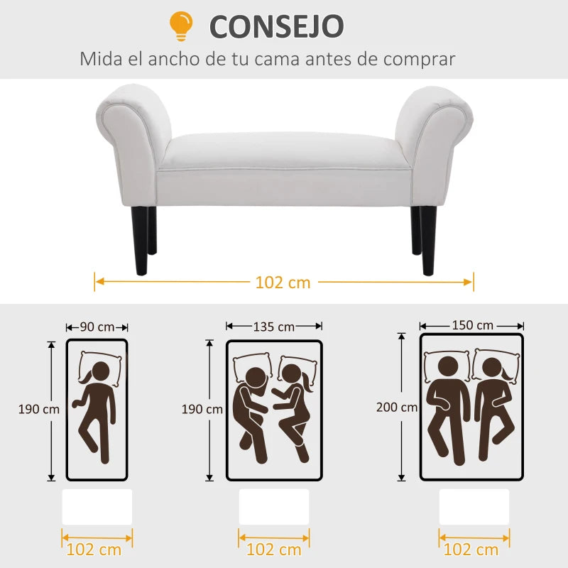 Banqueta colocada a los pies de la cama en el dormitorio