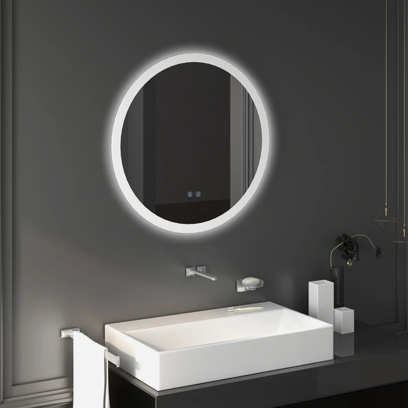 Espejo de baño Calera iluminando un baño moderno y ordenado