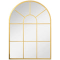 Espejo de pared dorado con forma de ventana arqueada visto de frente