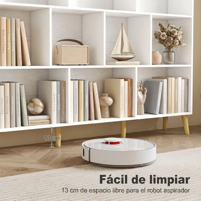Robot aspirador limpiando bajo la estantería gracias a sus 13 cm de altura libre