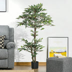 Ficus artificial Kyoto colocado junto a un sofá en un salón
