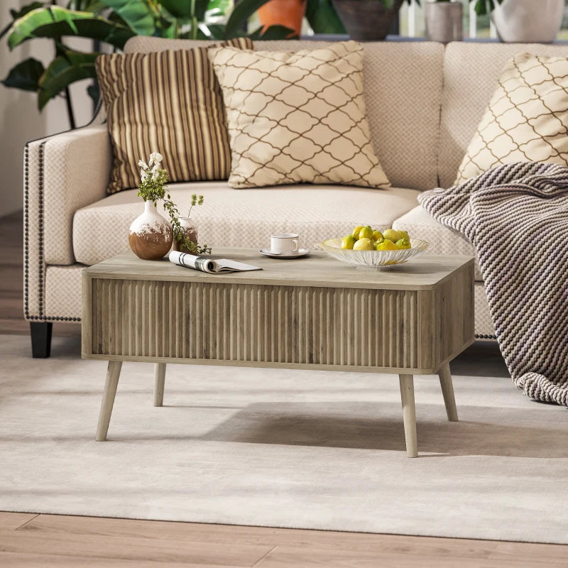 Mesa de centro elevable Roblén integrada en un salón contemporáneo con sofá