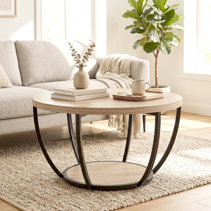 Mesa de centro redonda Nôvik integrada en un salón con sofá y decoración cálida