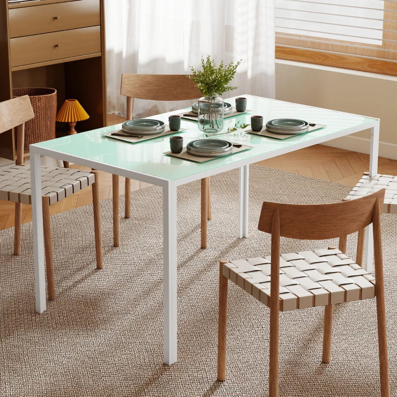 Mesa de comedor de cristal blanco colocada en una cocina luminosa