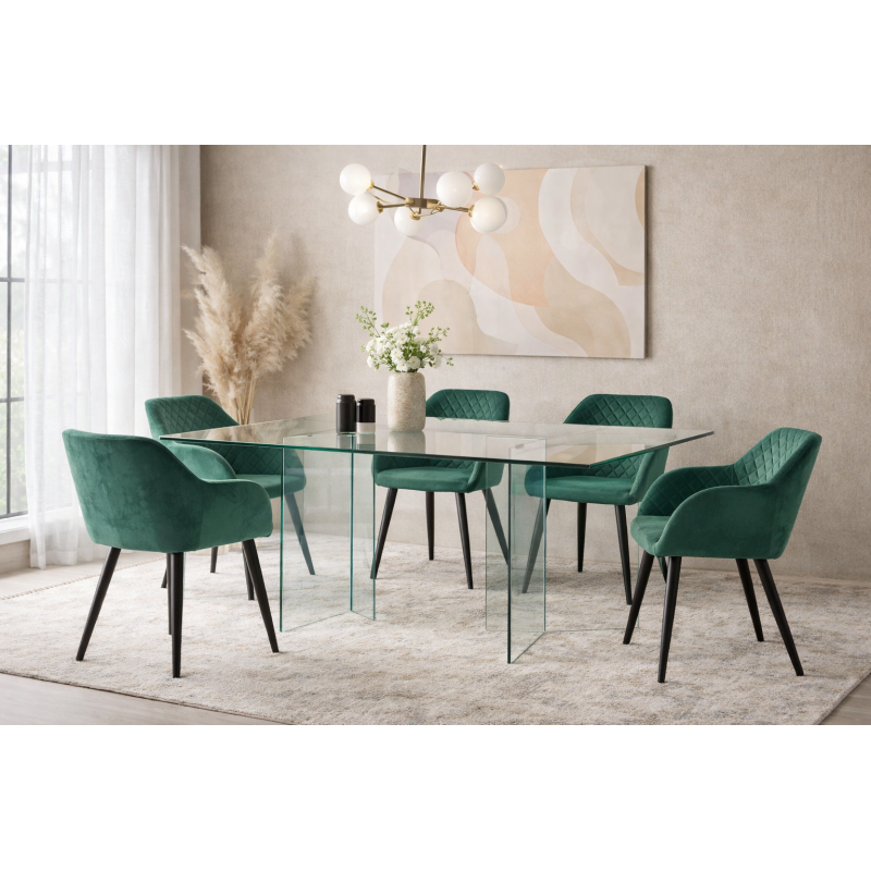 Mesa de cristal Phoenix en un comedor moderno con sillas