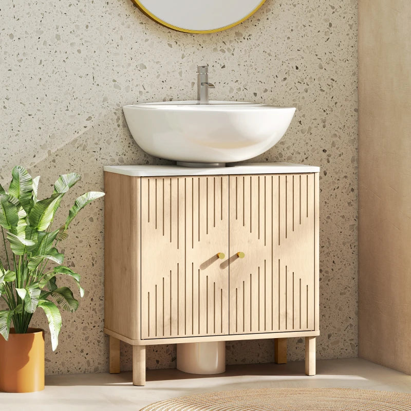 Mueble Ambrosel bajo un lavabo en un baño moderno