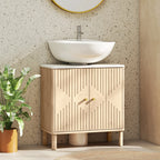 Mueble Ambrosel bajo un lavabo en un baño moderno