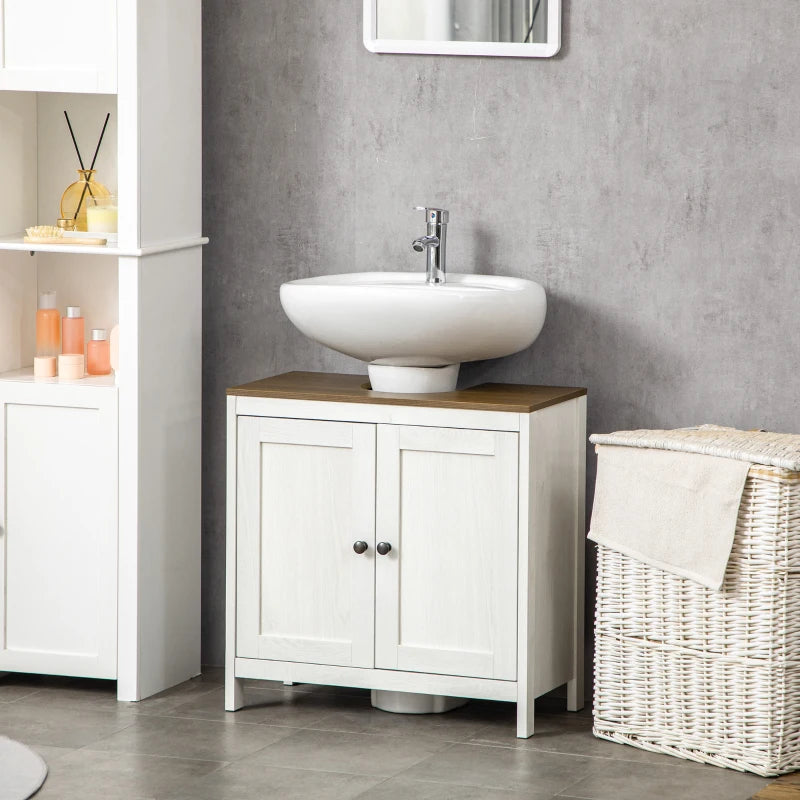 Mueble bajo lavabo Torgny colocado en un baño pequeño y ordenado