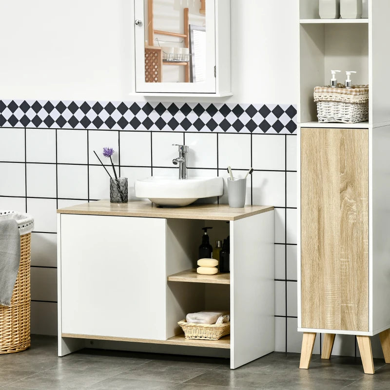 Mueble Tovaren con lavabo en un baño moderno
