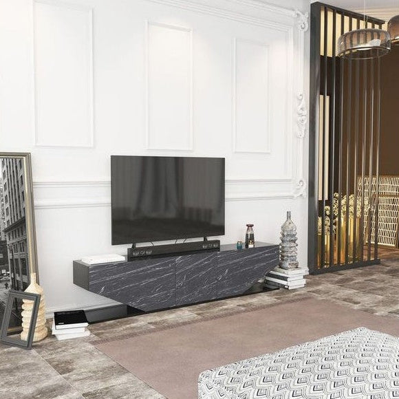 Mueble TV Eclipse bajo un televisor en un salón moderno