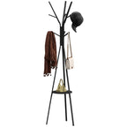 Perchero de pie Willow de metal negro con forma de árbol en la entrada de una casa