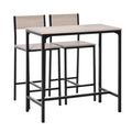Set Malmö de mesa de bar y dos taburetes con respaldo en una cocina
