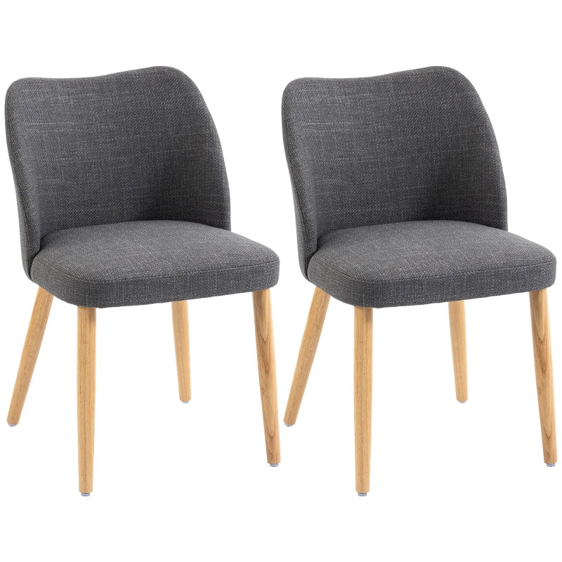 Detalle del respaldo curvo envolvente de la silla de comedor Fika