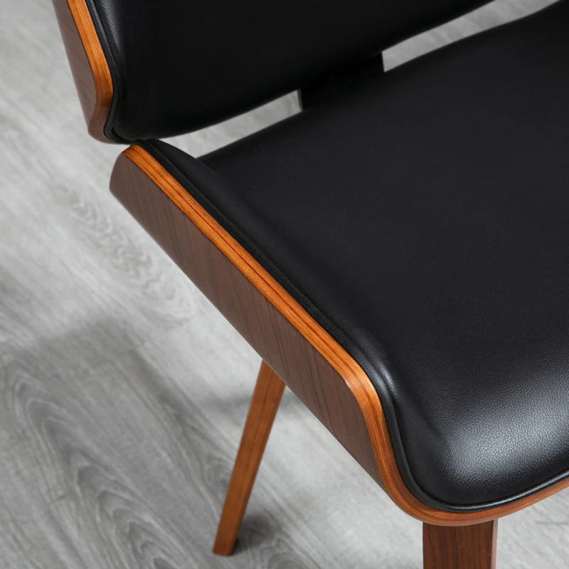Detalle del asiento acolchado tapizado en cuero sintético negro