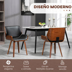 Sillas negras de cuero sintético en un salón de estilo moderno