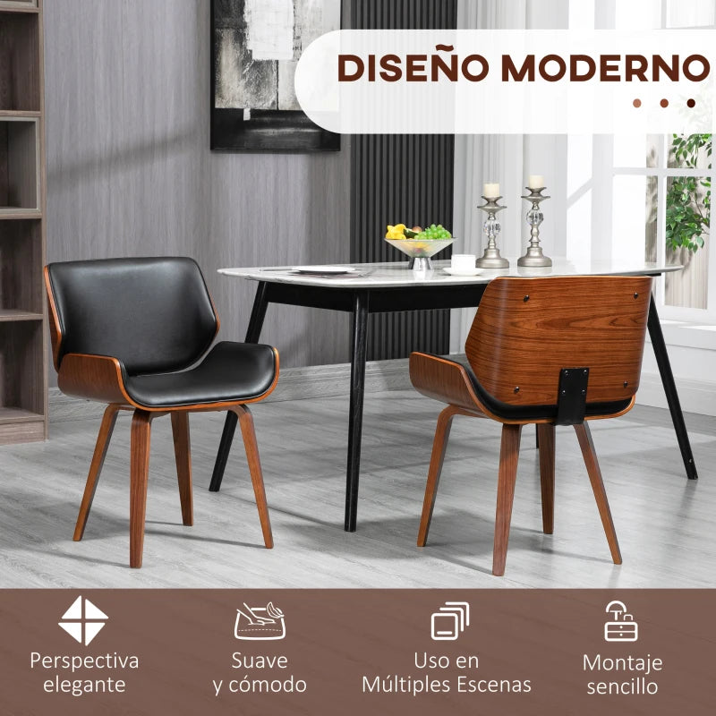 Sillas negras de cuero sintético en un salón de estilo moderno