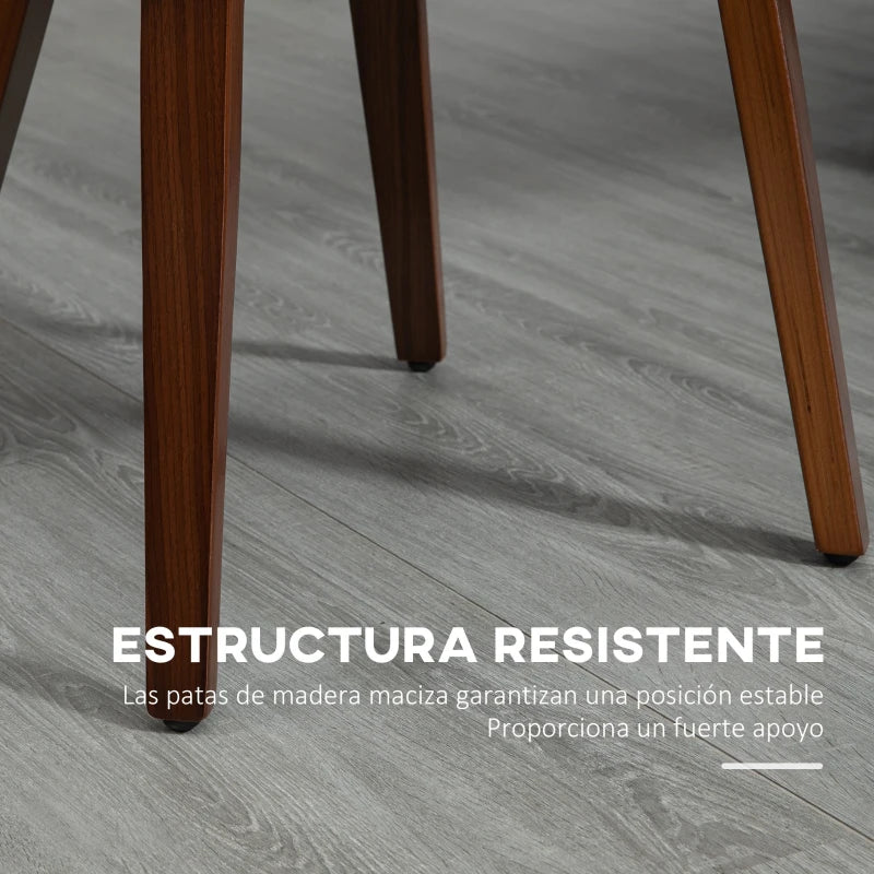 Detalle de las patas de madera de álamo en tono nogal de la silla