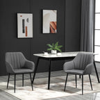 Sillas Ashford tapizadas en lino gris en un salón de estilo moderno