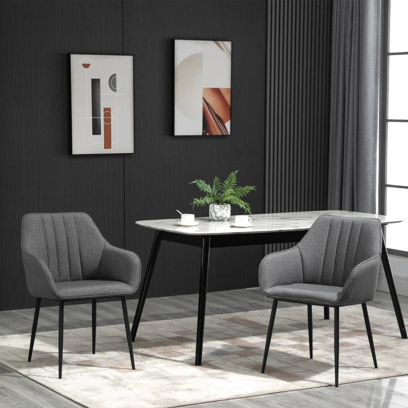 Sillas Ashford tapizadas en lino gris en un salón de estilo moderno