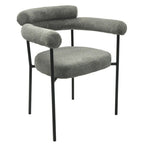 Sillón Nube tapizado en bouclé gris con patas de metal negro