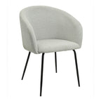 Sillón Bruma tapizado en tejido tipo lino gris claro con patas de metal negro